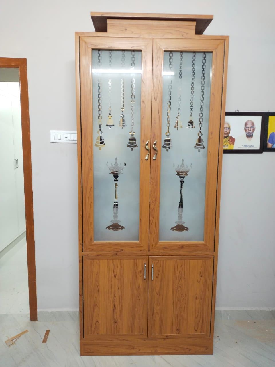 White carved-look PVC/uPVC pooja unit installed by No More Wood in Chennai