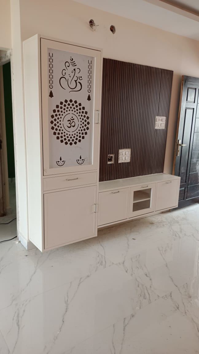 Warm mauve-tone PVC/uPVC TV unit installed by No More Wood in Chennai